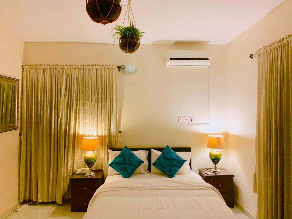 Redwood Place Hotel Abuja Esterno foto